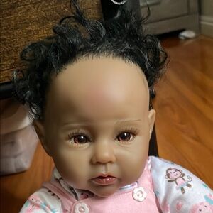 Realistic Baby Doll with Pink Outfit